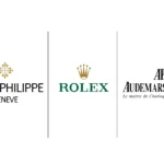 صورة تضم شعارات ثلاث من أبرز شركات الساعات الفاخرة في العالم: باتيك فيليب المعروفة بتصاميمها الكلاسيكية والمبتكرة، رولكس التي تمثل رمزًا للأناقة والجودة، وأوديمار بيغيه التي تعكس التفوق والإبداع في صناعة الساعات السويسرية. - الصورة من شركات Patek Philippe وRolex وAudemars Piguet.